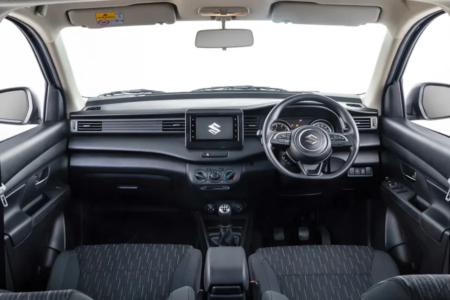 Clean driver's cockpit of the RiseEdge 7-seater